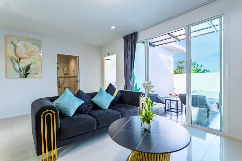 Living room, Seating area, Pool view