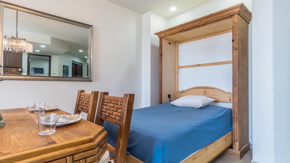 Bed, Seating area, Dining area, Bedroom