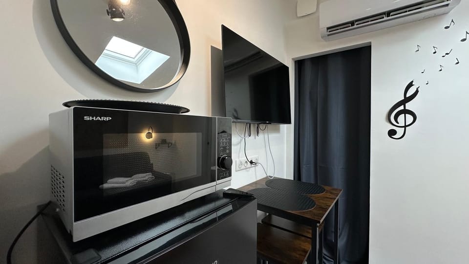 Communal lounge/ TV room, TV and multimedia, Kitchen or kitchenette, air conditioner