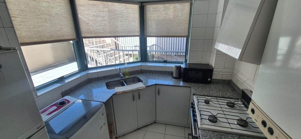 Kitchen or kitchenette, oven