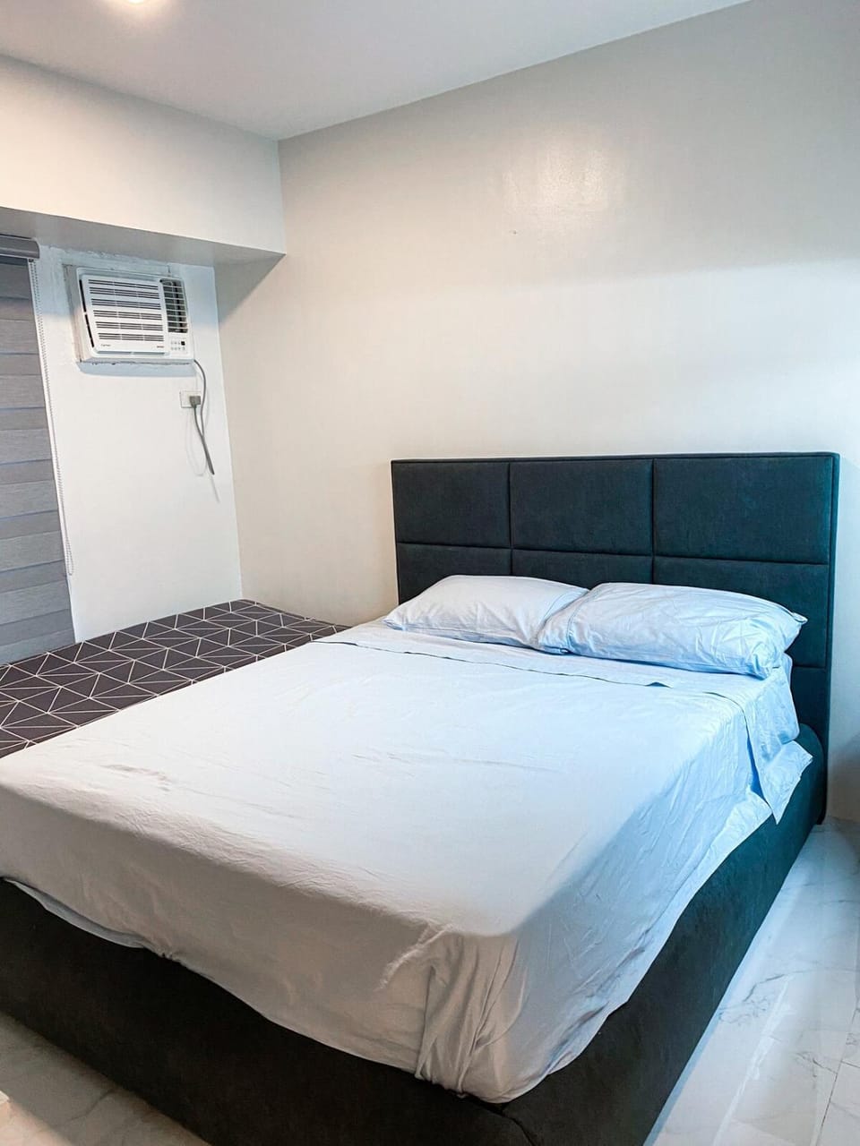 2BR Across SM San Lazaro Self Check-In & Parking Option Apartment in Manila City