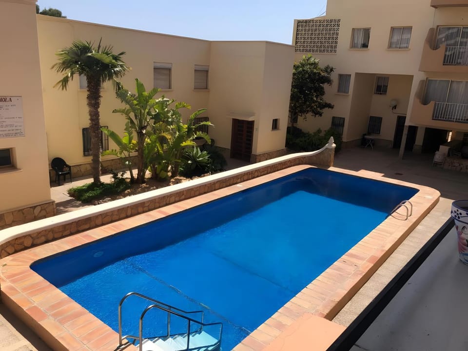 Property building, Living room, Swimming pool