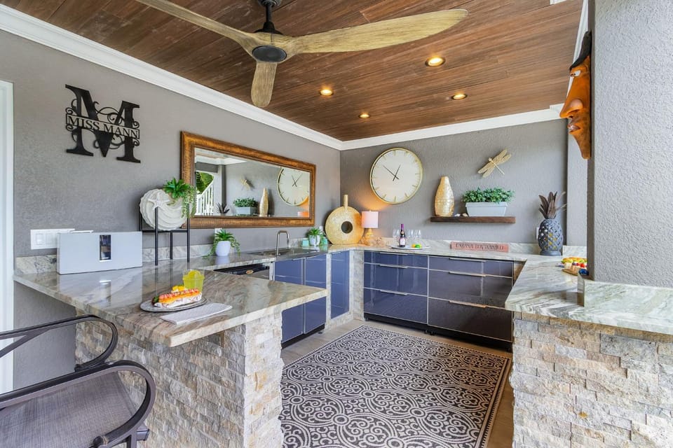Luxury Waterfront Getaway with Heated Pool, Dock & Outdoor Kitchen - The Primo House House in Estero Island
