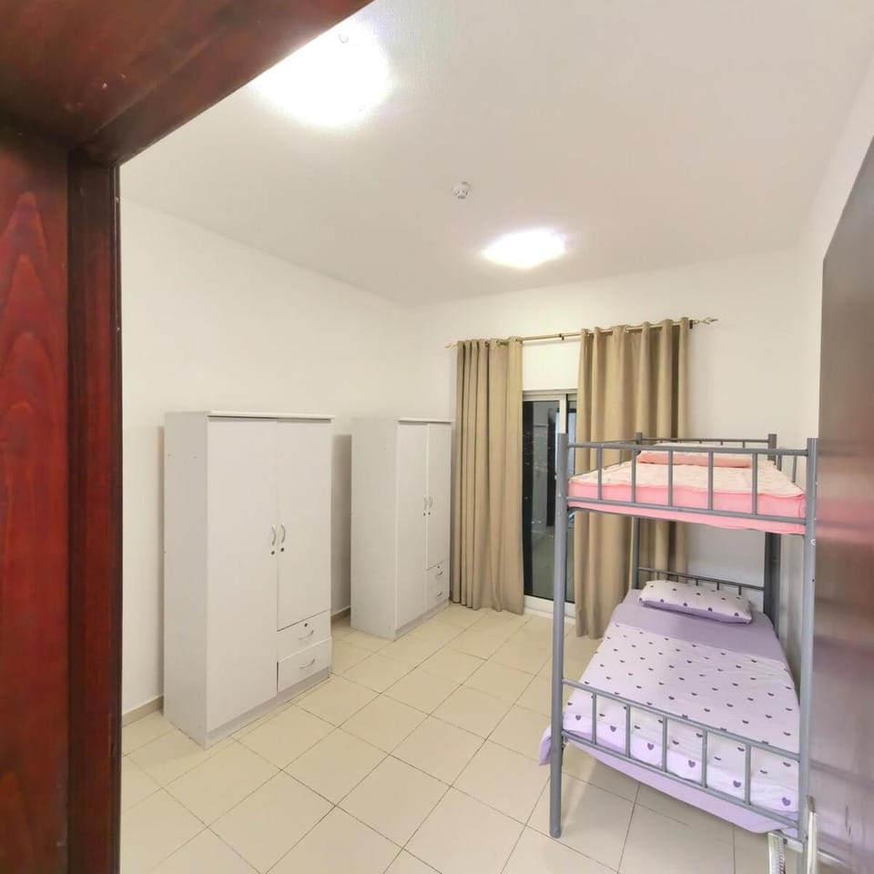 Photo of the whole room, bunk bed, wardrobe