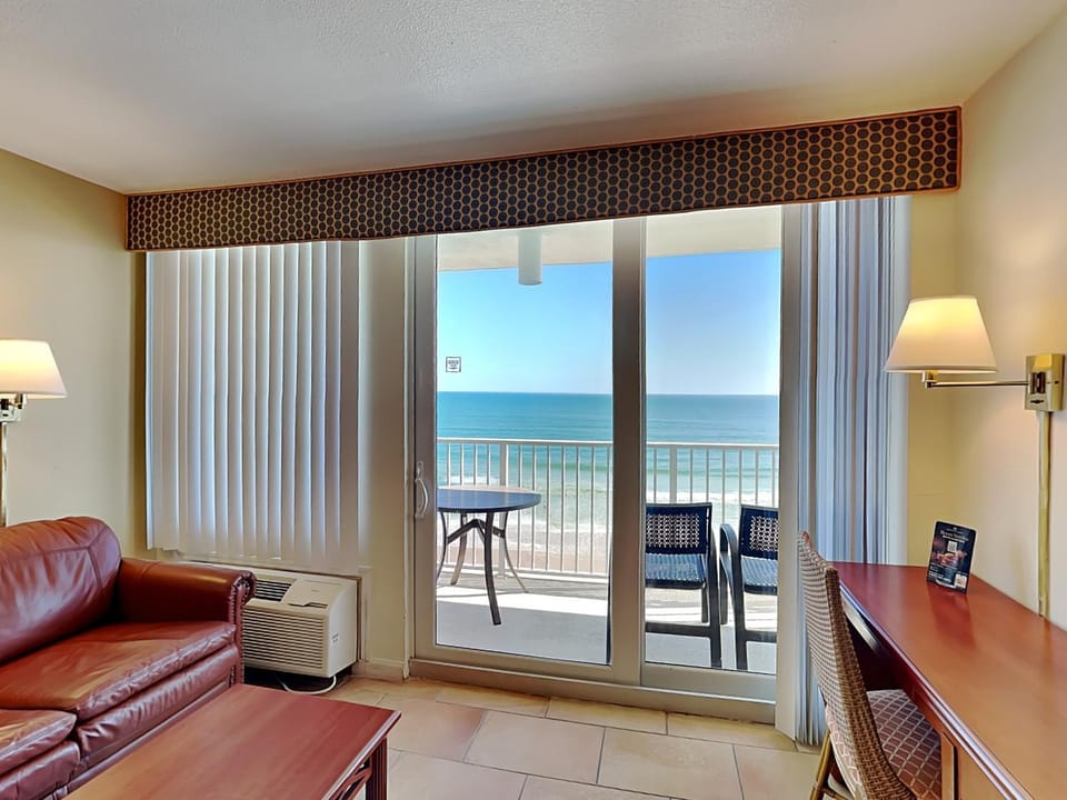 Day, View (from property/room), Balcony/Terrace, Living room, Seating area, Beach, Sea view, furniture, air conditioner
