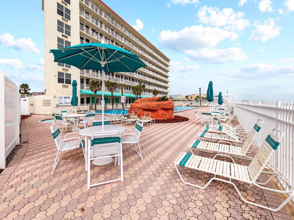 Property building, Patio, Seating area, Area and facilities