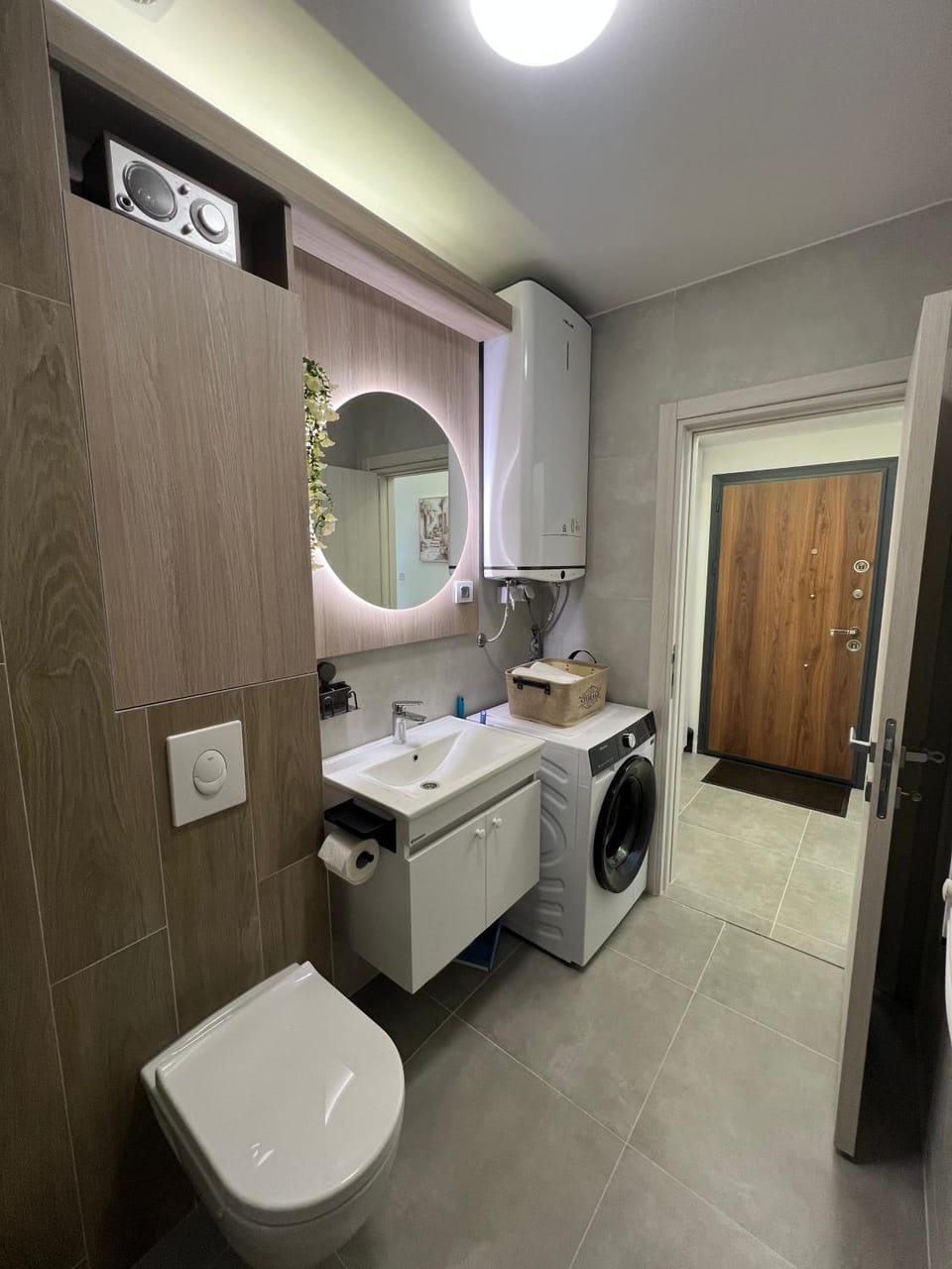 Toilet, Bathroom, towels, washing machine, dryer