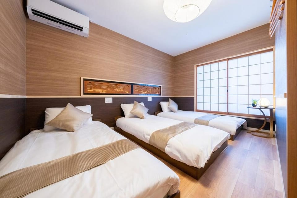 拓 taku 陶器のお風呂 旅の疲れを癒す新しいお部屋 USJまで10分 ベッド16台 6つの寝室 Villa in Osaka
