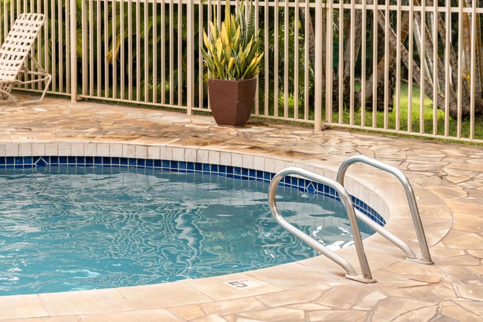 Swimming pool, sunbed