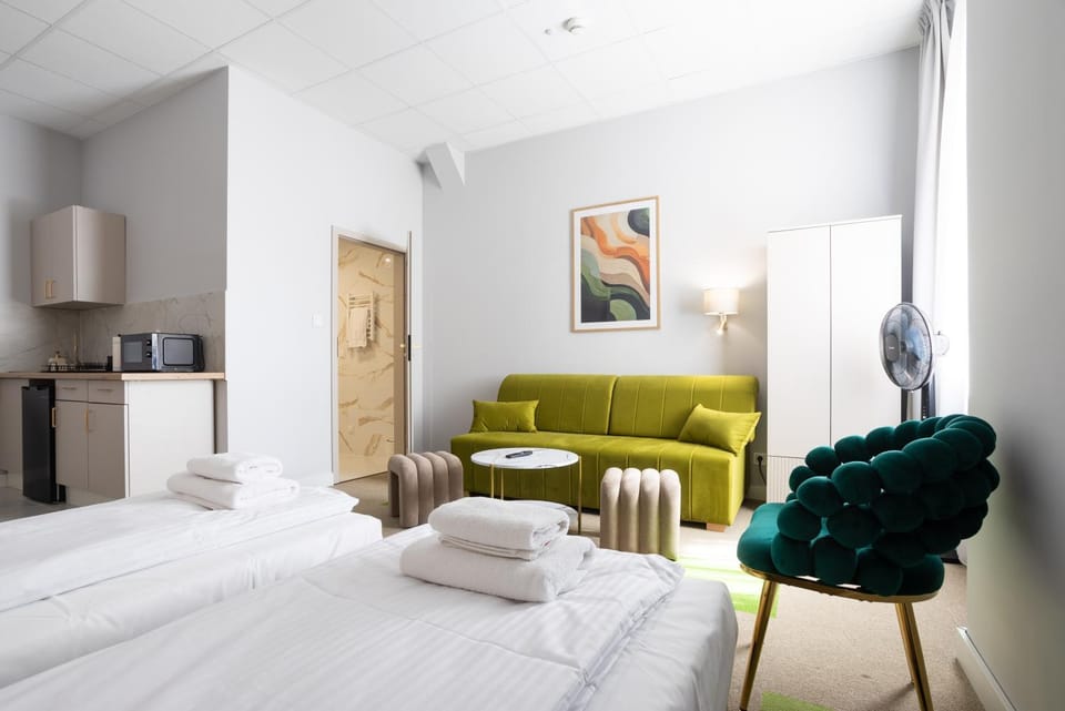 Bed, Living room, Photo of the whole room, Seating area, Bedroom, towels, wardrobe