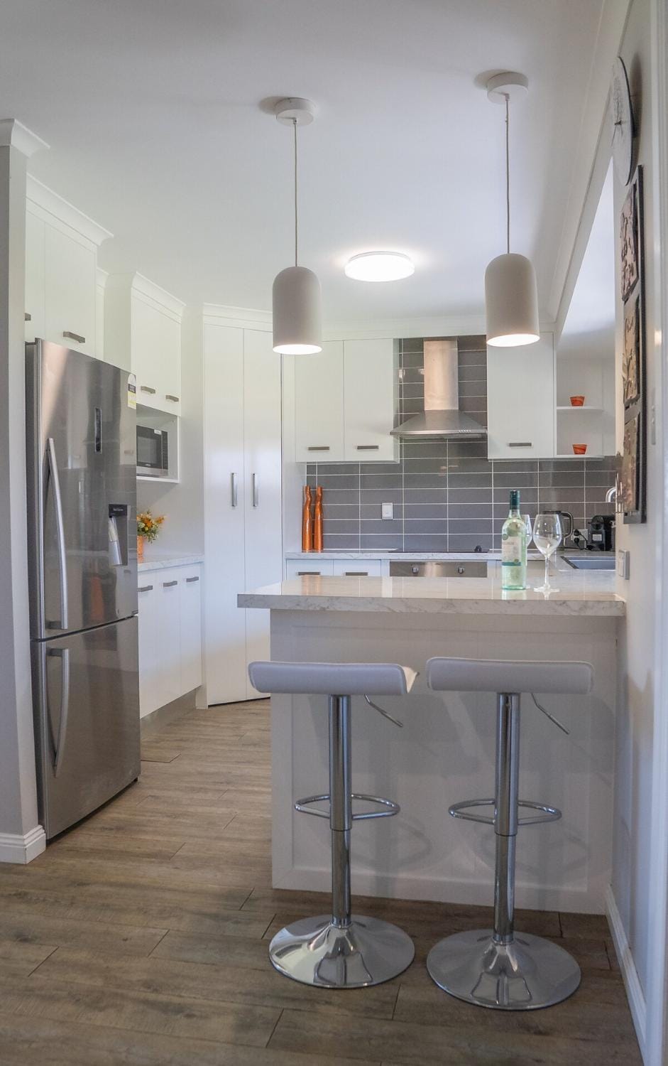 Kitchen or kitchenette, dishwasher, oven, stove