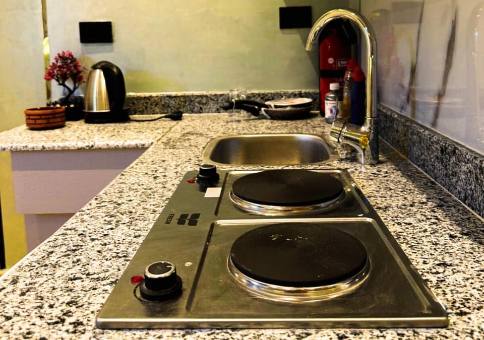Kitchen or kitchenette, stove