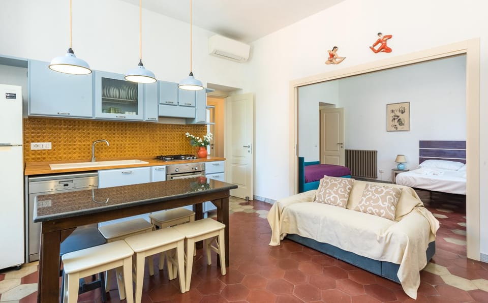 Kitchen or kitchenette, Living room, Photo of the whole room, Seating area, Dining area, oven, stove, air conditioner