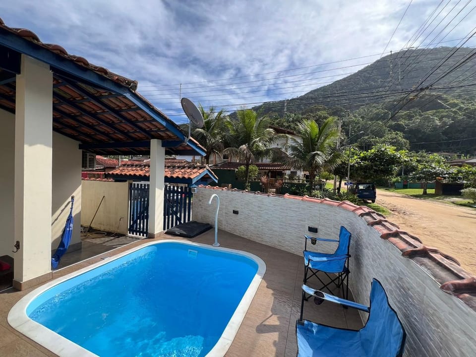 Linda casa c/ piscina a poucos passos da Praia House in State of São Paulo