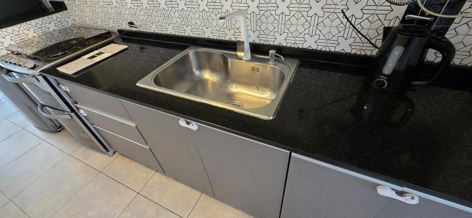 Kitchen or kitchenette, stove