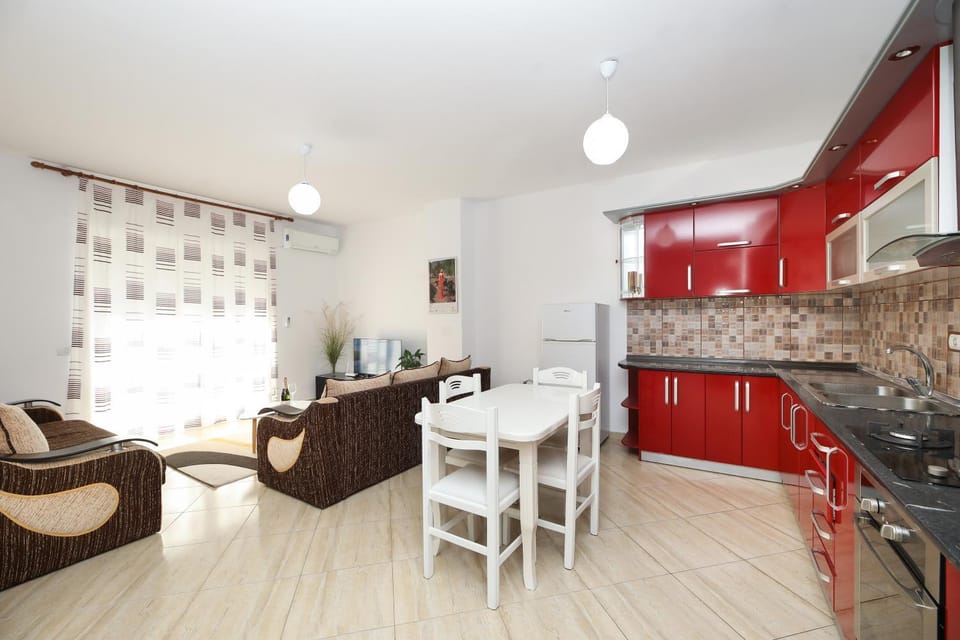 Kitchen or kitchenette, Living room, Seating area, Dining area