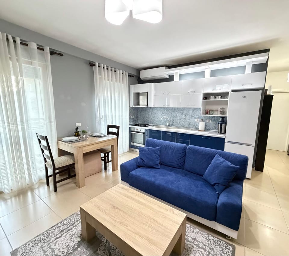 Kitchen or kitchenette, Living room, Seating area, stove