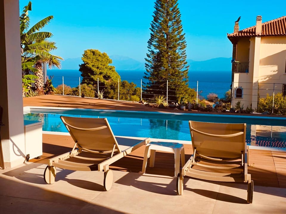 Property building, Patio, View (from property/room), Garden view, Mountain view, Pool view, Swimming pool, sunbed