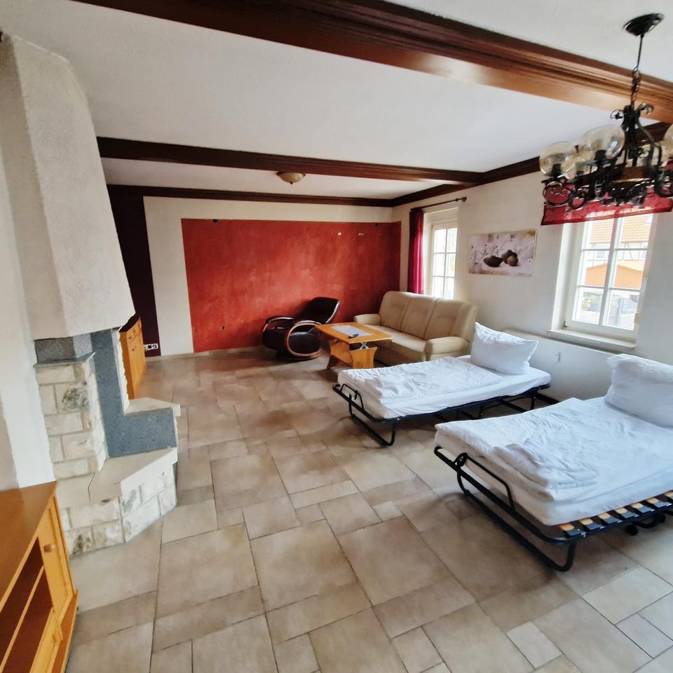 Bed, Living room, Seating area, Bedroom