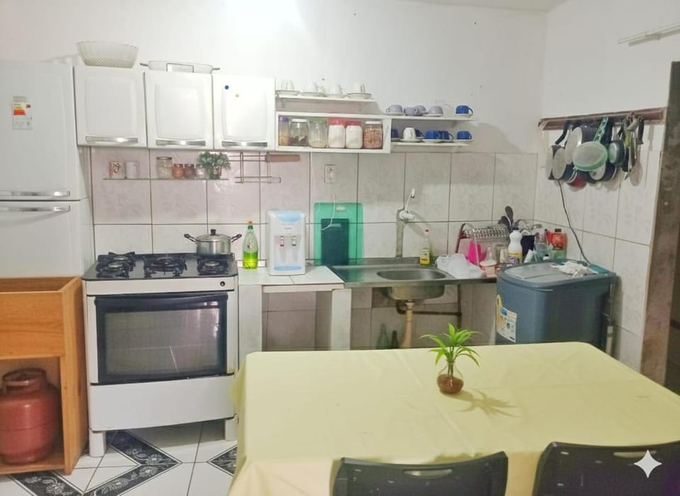 Kitchen or kitchenette, dishwasher, stove, washing machine