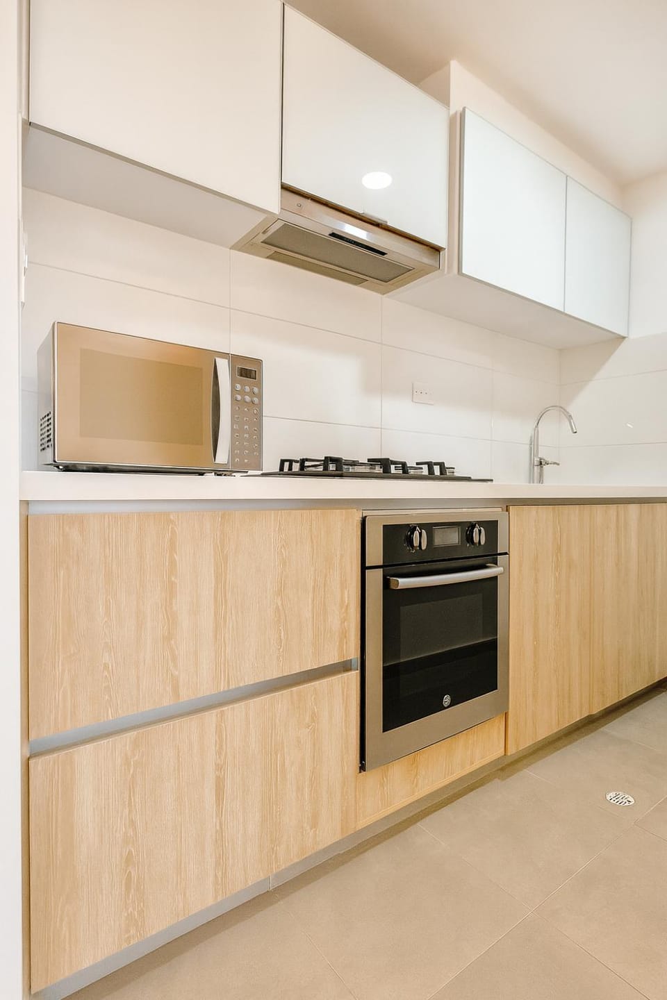Kitchen or kitchenette, dishwasher, oven, stove
