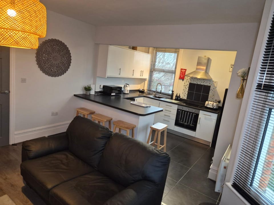 Living room, microwave, oven, stove, kitchen