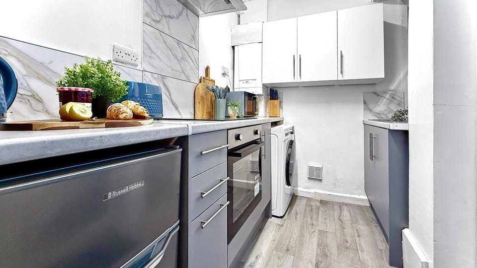 Kitchen or kitchenette, oven, stove