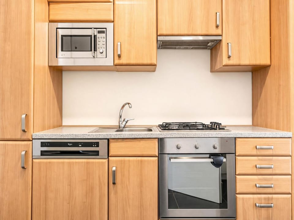 Kitchen or kitchenette, oven, stove, toaster