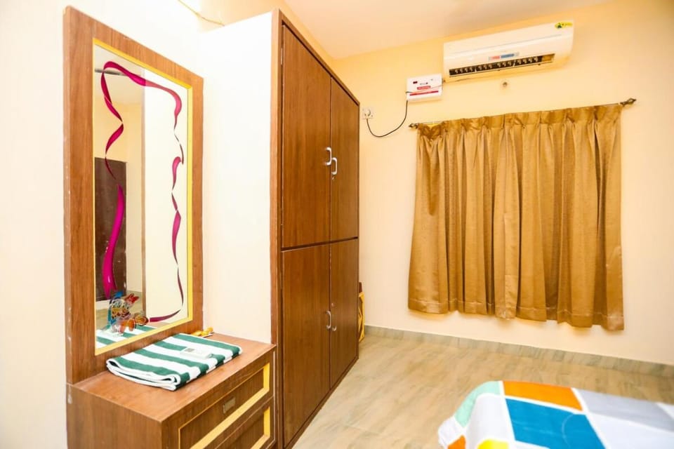 Bedroom, towels, wardrobe, air conditioner