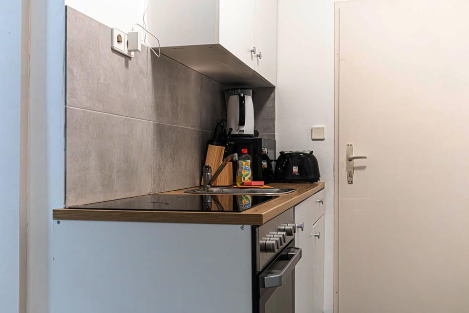 Kitchen or kitchenette, stove