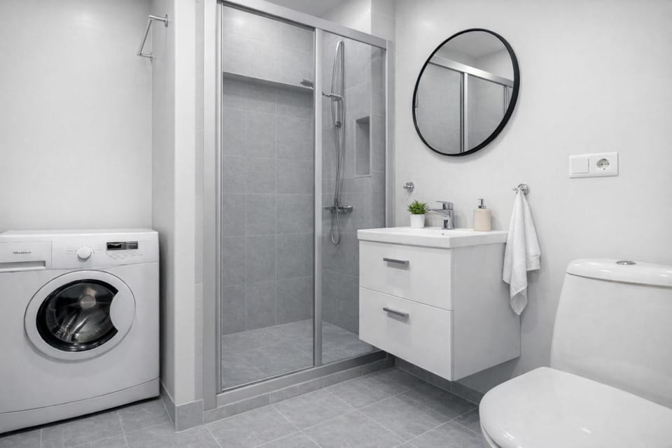 Shower, towels, washing machine, dryer