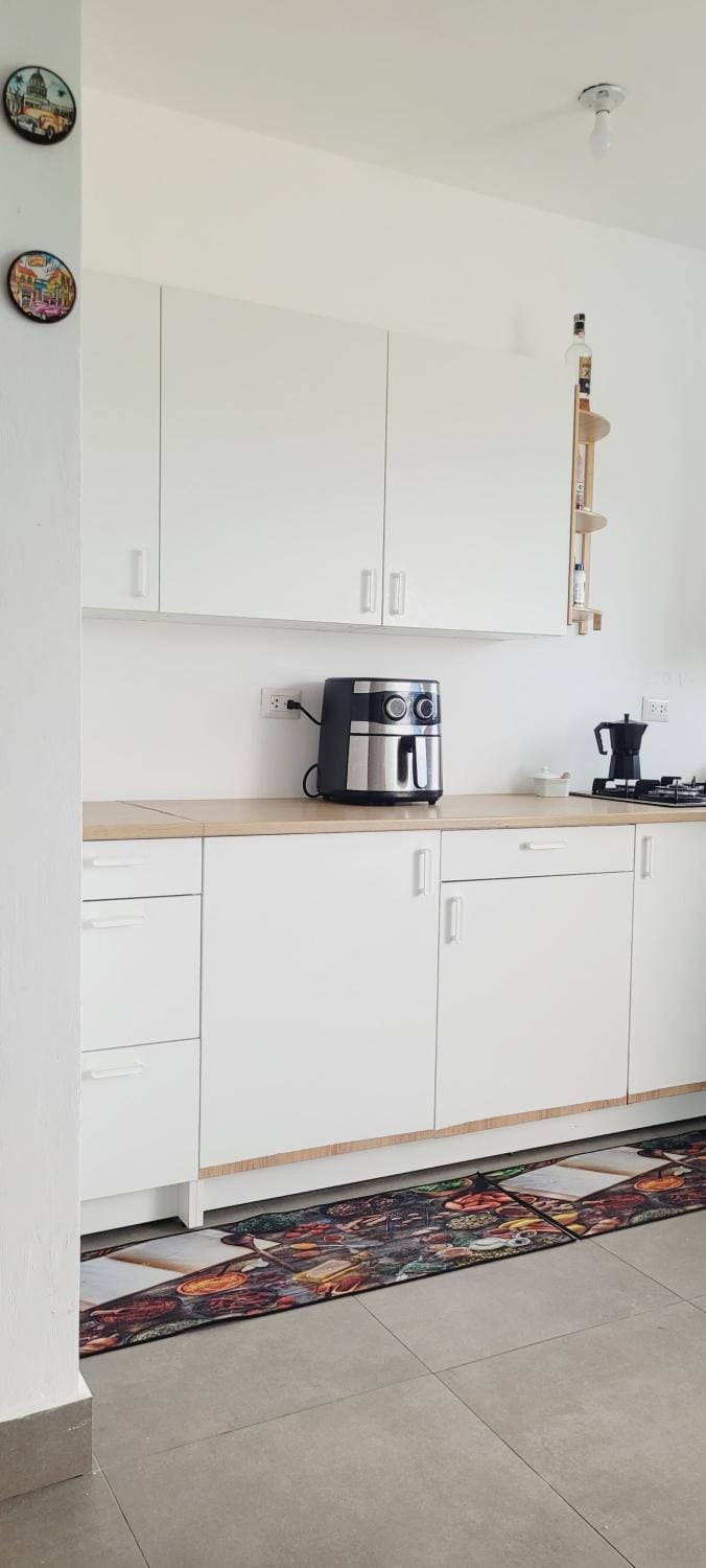 Kitchen or kitchenette, stove