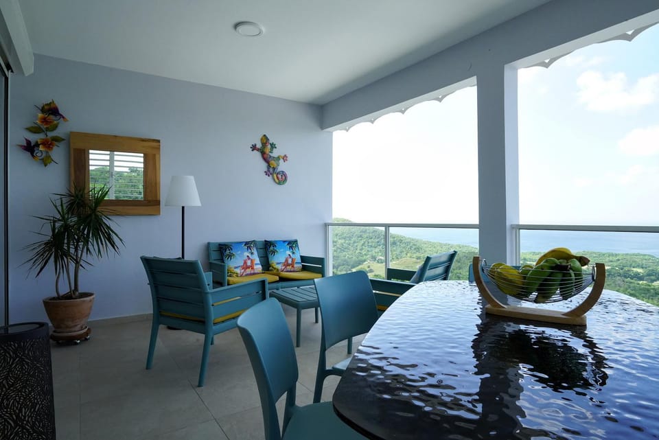 View (from property/room), Balcony/Terrace, Seating area, Dining area, Sea view