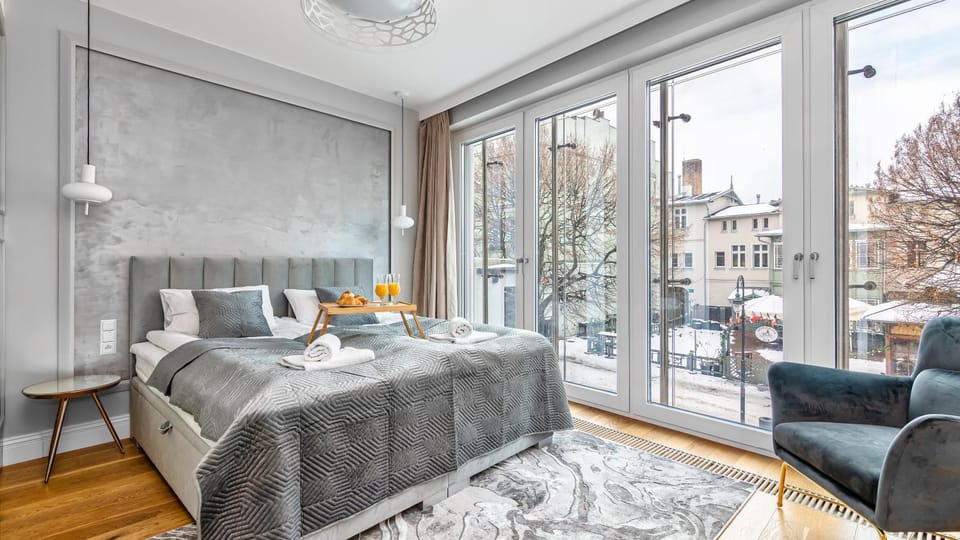 Bed, View (from property/room), Living room, Seating area, Bedroom