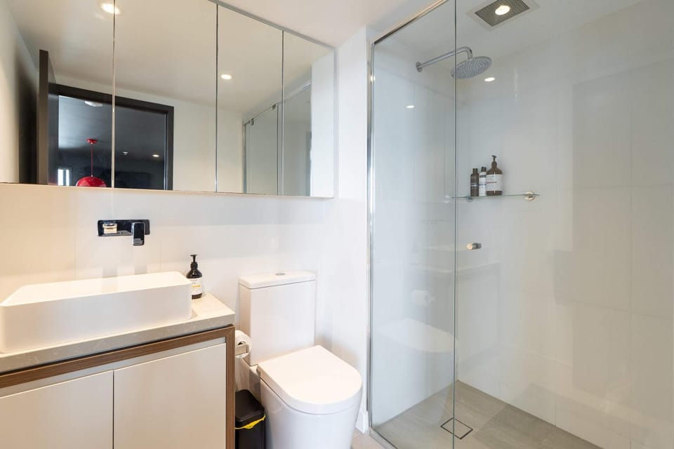 Shower, Toilet, Bathroom, hair dryier, towels