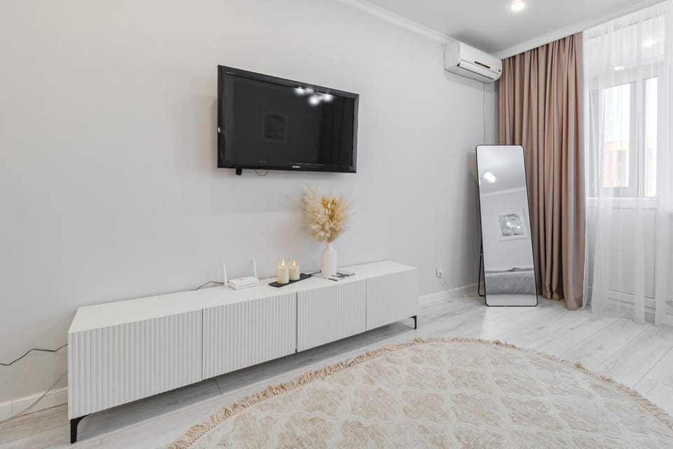 Тёплая и уютная студия в центре Левого берега Apartment in Kazakhstan