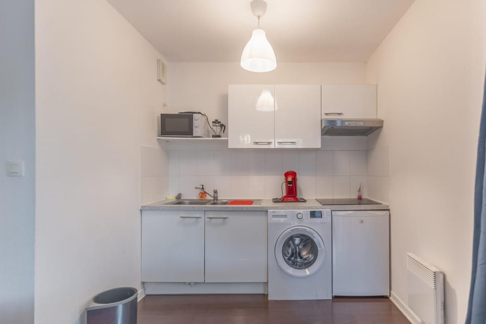 Kitchen or kitchenette, microwave, toaster, washing machine, kitchen