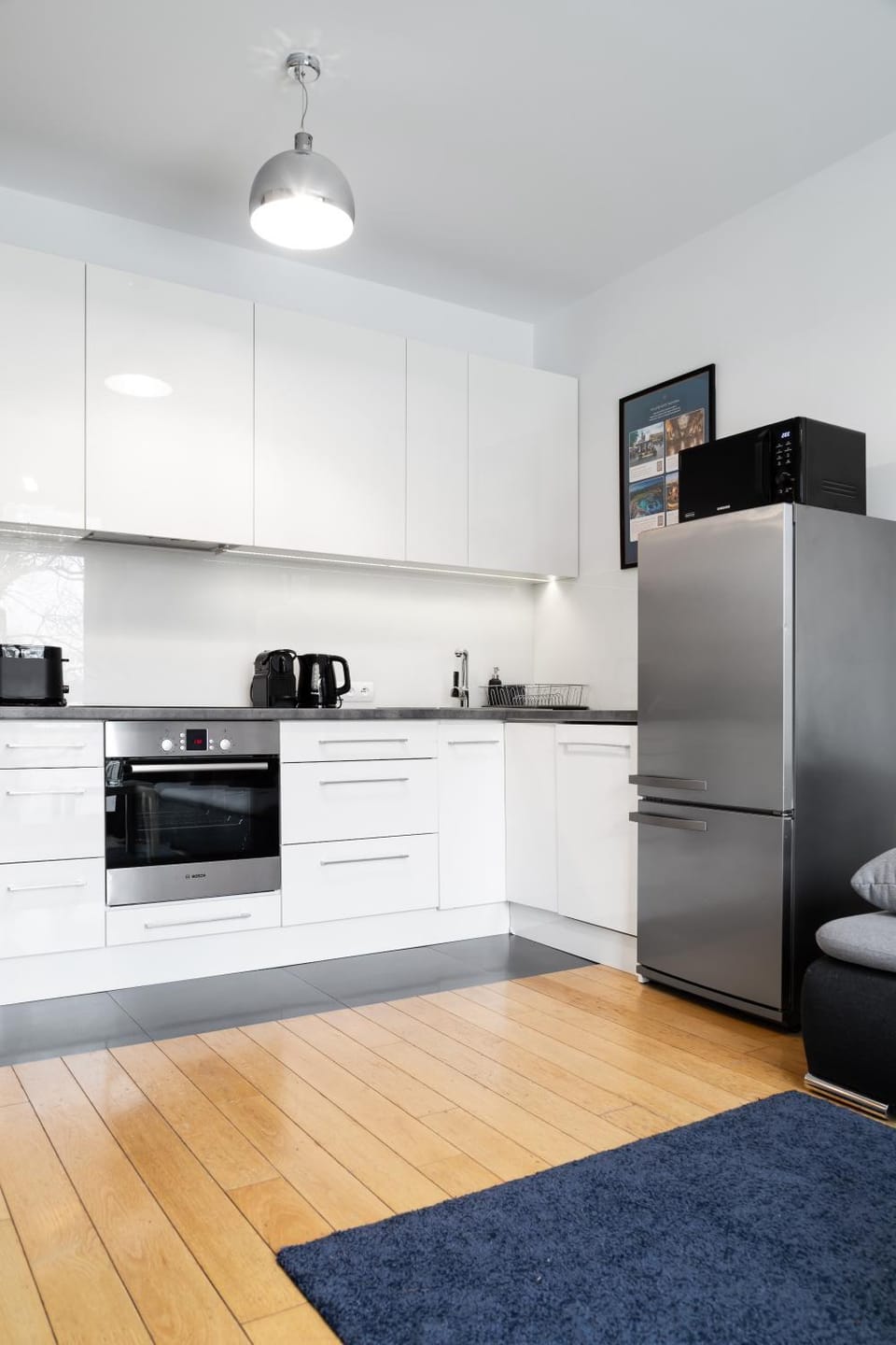 Kitchen or kitchenette, dishwasher, oven, stove, toaster
