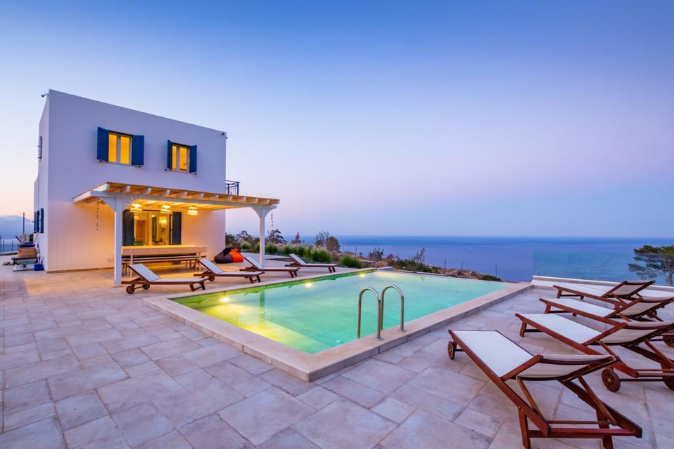 Property building, Patio, Natural landscape, Pool view, Sea view, Swimming pool, sunbed