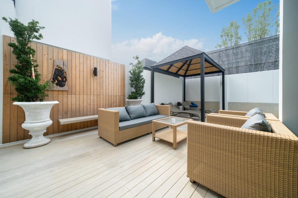 Patio, Seating area, Garden view, sunbed