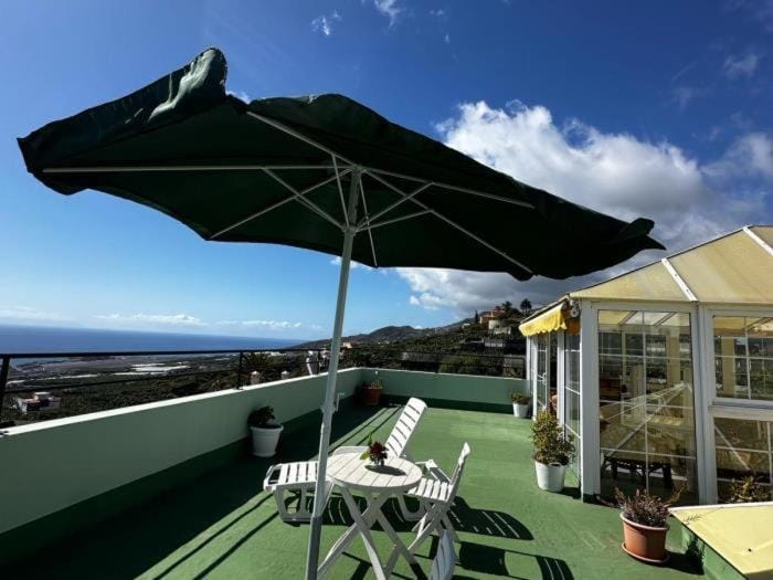 Property building, Natural landscape, Balcony/Terrace, Mountain view, Sea view, sunbed