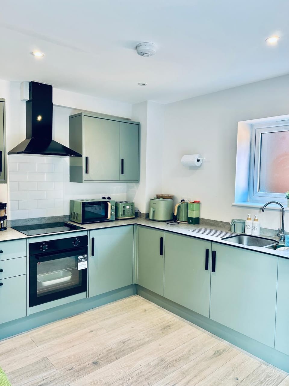 Kitchen or kitchenette, oven, stove, toaster