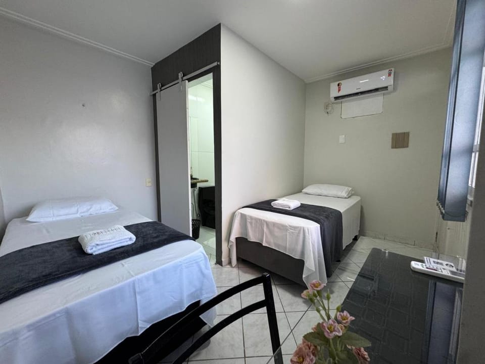 Bed, Photo of the whole room, Bedroom, towels, air conditioner