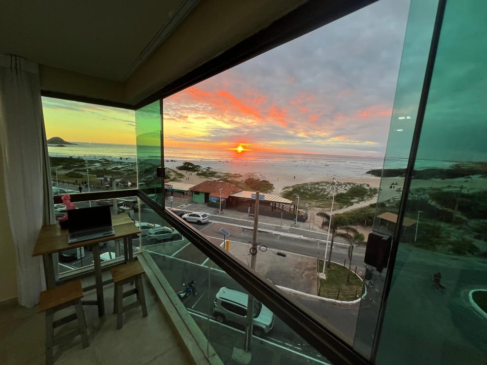 Natural landscape, View (from property/room), Dining area, Sea view, Sunset