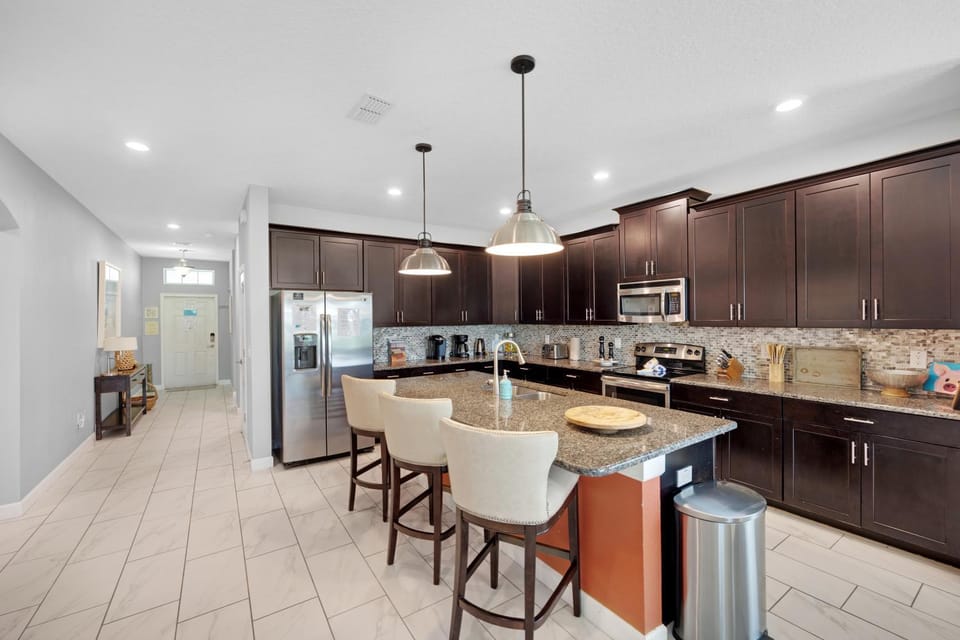 Kitchen or kitchenette, dishwasher, oven, stove