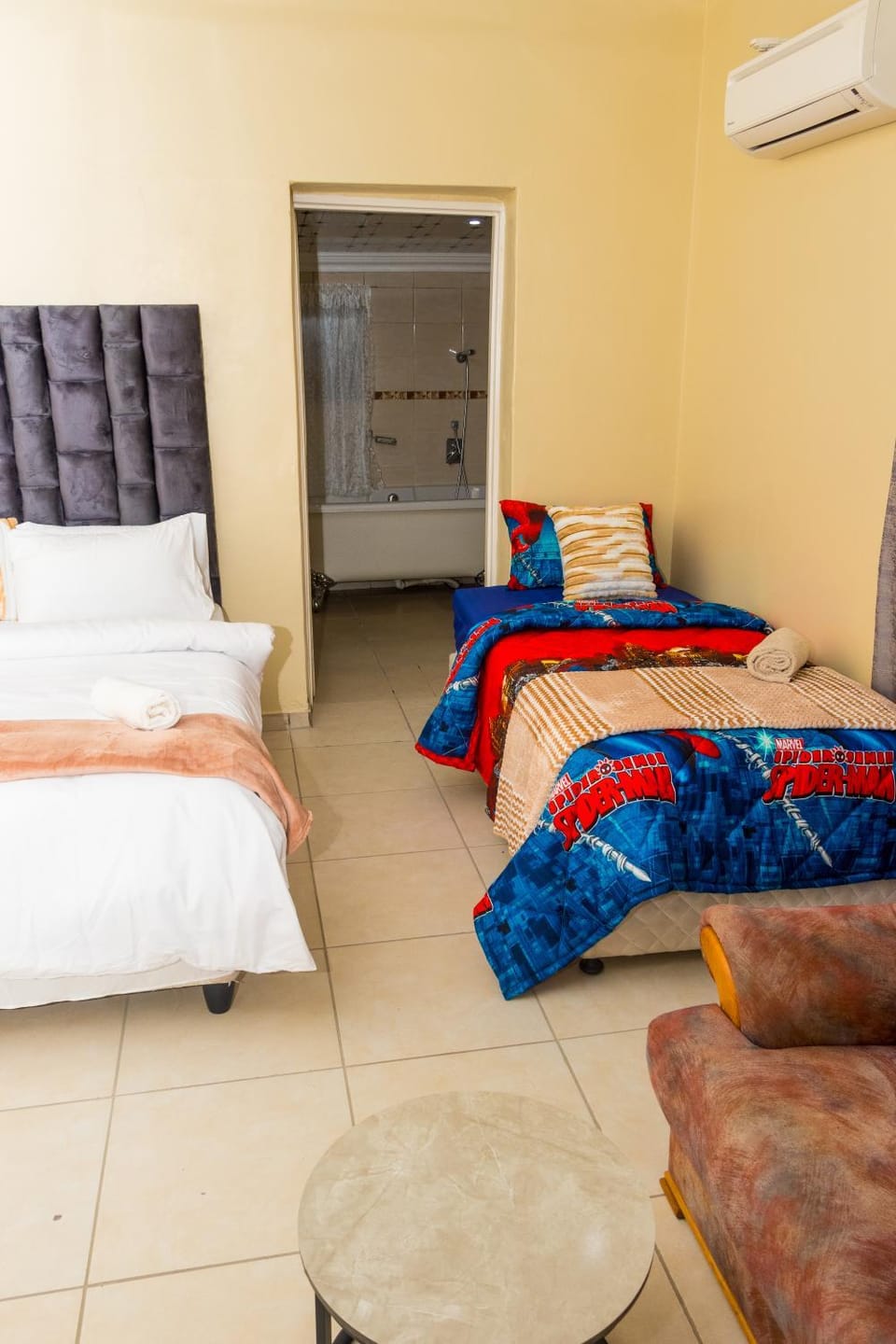 Bed, Living room, Seating area, Bedroom, air conditioner