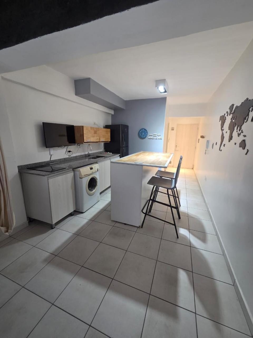 Kitchen or kitchenette, Dining area, stove, washing machine