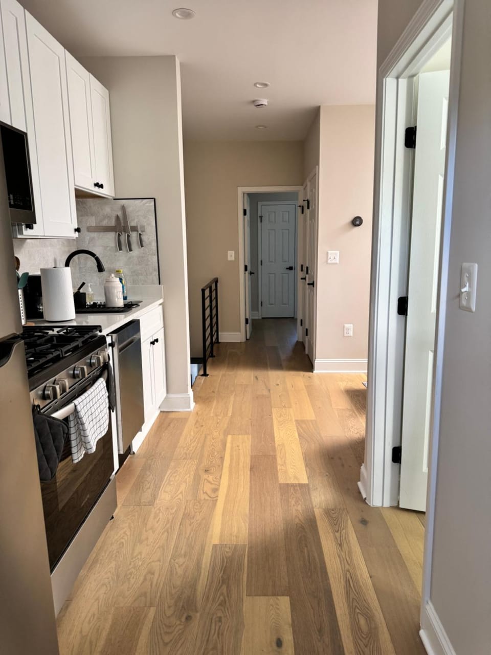 Kitchen or kitchenette, dishwasher, oven, stove