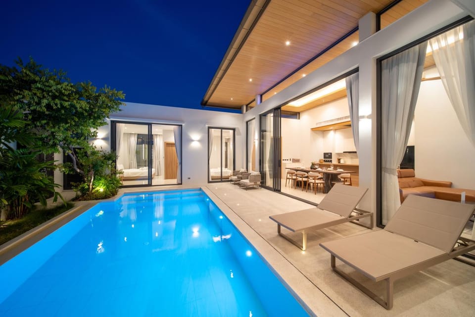 Property building, Night, Pool view, Swimming pool, sunbed