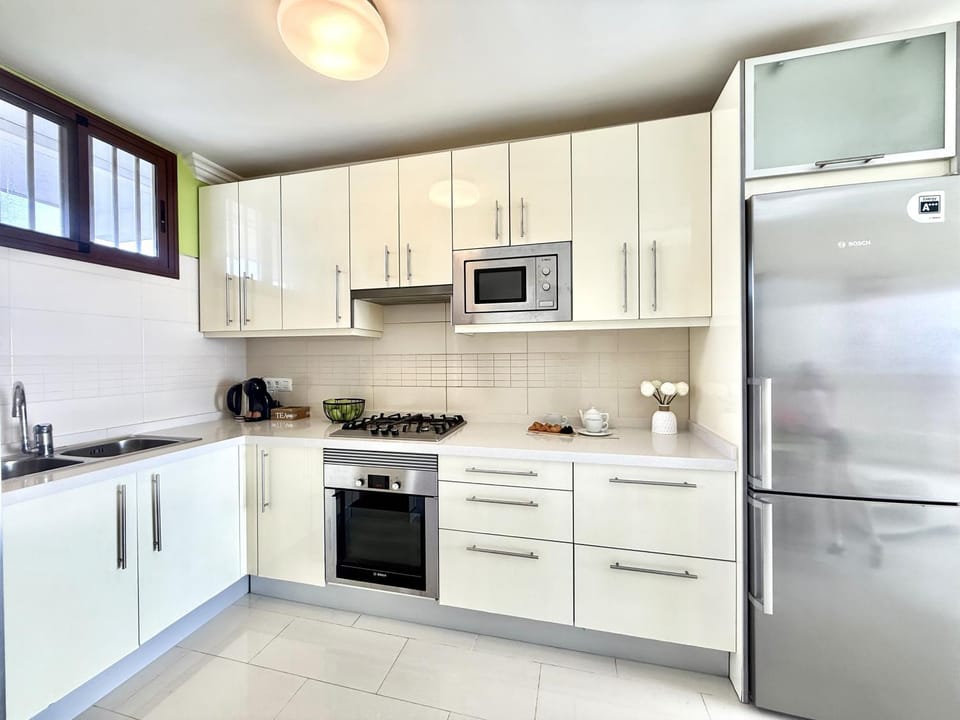 Kitchen or kitchenette, oven, stove, toaster